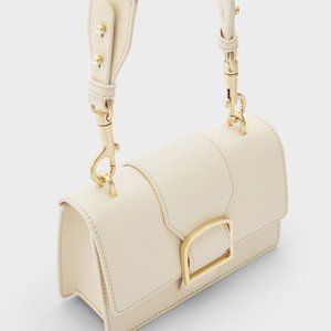 Wide shoulder strap crossbody small square bag